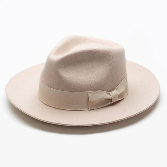 Cream Fedora Hat - Handcrafted from wool featuring a shallow indented crown and tonal grosgrain ribbon.